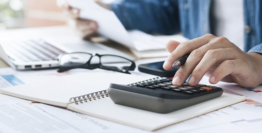 Person using calculator