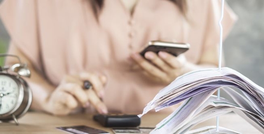 Person using calculator